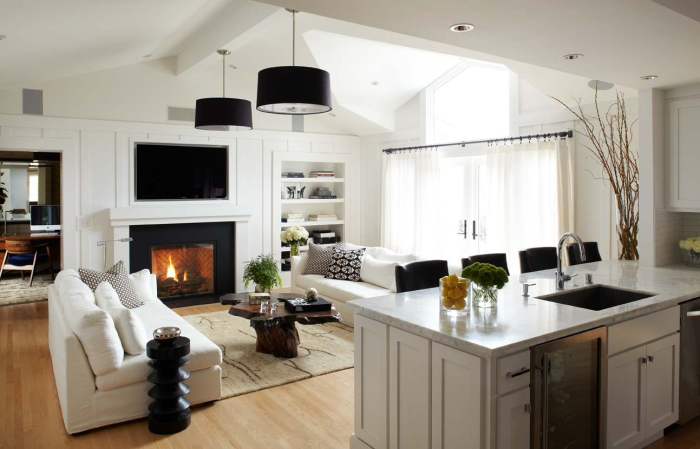 drum-chandelier-and-modern-fireplace-surrounds-with-built-in-shelves-plus-sofas-and-area-rug-with-coffee-table-for-family-room-ideas